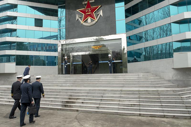 190115-N-ES994-0201 NANJING, China (Jan. 15, 2019) Chief of Naval Operations (CNO) Adm. John Richardson visits the People's Liberation Army (Navy) (PLA(N)) Command College for a roundtable discussion where he underscored the importance of lawful and safe operations around the globe. Richardson is on a three-day visit to Beijing and Nanjing to continue the ongoing dialog between the two militaries and encourage professional interactions at sea, specifically addressing risk reduction and operational safety measures to prevent unwanted and unnecessary escalation. (U.S. Navy Photo by Chief Mass Communication Specialist Elliott Fabrizio/Released)