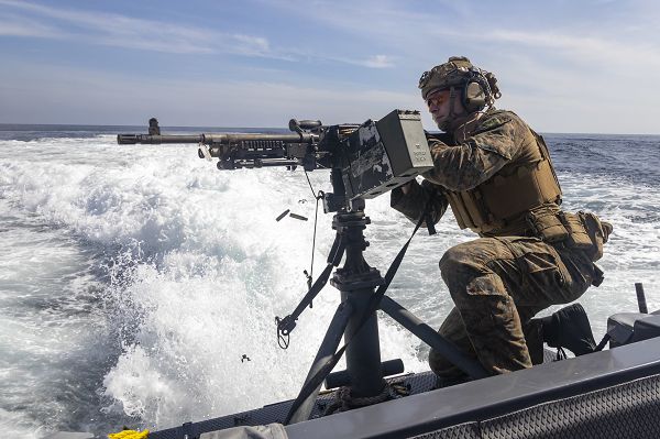 ANDAMAN SEA (Jan. 11, 2023) – A U.S. Marine with Maritime Raid Platoon, 13th Marine Expeditionary Unit, fires an M240B machine gun from an 11-meter rigid-hull inflatable boat during a machine gun range, Jan. 11. The 13th Marine Expeditionary Unit is embarked on the Makin Island Amphibious Ready Group, comprised of amphibious assault ship USS Makin Island (LHD 8) and amphibious transport dock ships USS John P. Murtha (LPD 26) and USS Anchorage (LPD 23), and operating in the U.S. 7th Fleet area of operations. 7th Fleet is the U.S. Navy's largest forward-deployed numbered fleet, and routinely interacts and operates with Allies and partners in preserving a free and open Indo-Pacific region. (U.S. Marine Corps photo by Cpl. Austin Gillam)