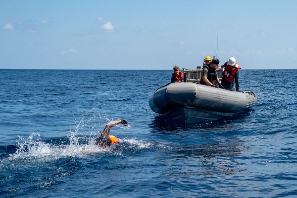 PACIFIC OCEAN (August 28, 2023) Ens. Conor Backhaus, from Omaha, Nebraska, assigned to the forward-deployed amphibious transport dock ship USS Green Bay (LPD 20), participates in small boat operations during a man overboard drill, August 28. Green Bay is operating in the 7th Fleet area of operations. U.S. 7th Fleet is the U.S. Navy’s largest forward-deployed numbered fleet, and routinely interacts and operates with allies and partners in preserving a free and open Indo-Pacific region. (U.S. Navy photo by Mass Communication Specialist 2nd Class Matthew Cavenaile)