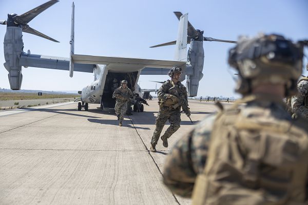 U.S. Marines with 1st Marine Division, I Marine Expeditionary Force (MEF) exit an MV-22B Osprey with 3rd Marine Aircraft Wing, I MEF, during the Marine Air-Ground Task Force (MAGTF) demonstration of the 2023 Marine Corps Air Station Miramar Airshow in San Diego, Sept. 23, 2023. The MAGTF Demo displays the coordinated use of close-air support, armor, artillery and infantry forces and provides a visual representation of how the Marine Corps operates. America's Airshow 2023 is a unique and incredible opportunity to witness Marine and joint aviation capabilities, civilian performers, and the world-famous Blue Angels; to interact first-hand with Marines, other service members, and first responders; and to see first-hand the innovative spirit of the Marine Corps through emerging technologies and forward-thinking. (U.S. Marine Corps photo by Cpl. Daniel Childs)