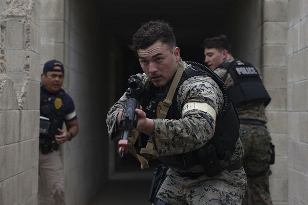 U.S. Marine Cpl. Christopher Mitchell, a military policeman with the Provost Marshal’s Office, Security and Emergency Services Battalion, Marine Corps Base Camp Pendleton, participates in a simulated active shooter scenario during exercise Semper Durus 23 on Camp Pendleton, California, April 11, 2023. Semper Durus is designed to improve regional command and control, enhance interagency coordination, and improve installation capabilities to respond to, and recover from, a crisis event and validate the installation mission assurance all-hazard plan. Mitchell is a native of Corcoran, California.(U.S. Marine Corps photo by Cpl. Angela Wilcox)