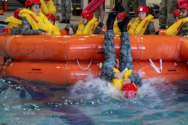 Airmen from the 22nd Training Squadron instruct water survival techniques to local Civil Air Patrol members at Fairchild Air Force Base, Wash., July 12, 2023. The 22nd Training Squadron’s Survival, Evasion, Resistance, and Escape course teach service members about surviving in austere environments. (U.S. Air Force photo by Staff Sgt. David Phaff) 