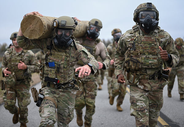 MEMORIAL LOG CARRY HONORING THE FALLEN