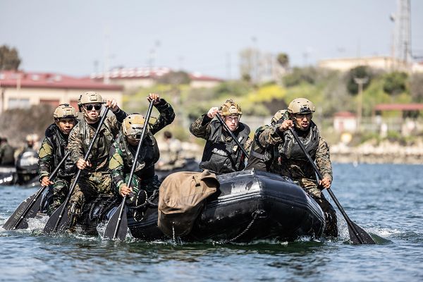 U.S. Marines with 2nd Platoon, Charlie Company, 1st Reconnaissance Battalion, 1st Marine Division, and members of the 2nd Intai Amfibi Battalion, Indonesian Korps Marinir, paddle back to shore on a combat rubber raiding craft during a reconnaissance exercise at Marine Corps Base Camp Pendleton, California, April 15, 2023. The Marines of 1st Recon Bn. host the bilateral training exercise annually to foster a spirit of cooperation and mutual respect between Indonesian service members and 1st MARDIV Marines and promote cultural exchange and understanding. (U.S. Marine Corps photo by Cpl. Cameron Hermanet)