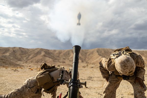 U.S. Marine Corps Lance Cpl. Edward Reyes, left, and Lance Cpl. Daniel Puente, both mortarman with Weapons Company, 1st Battalion, 23D Marine Regiment, 4th Marine Division, conducts a mortar range during Integrated Training Exercise 4-23 at Marine Corps Air Ground Combat Center Twentynine Palms, California on June 12, 2023. As the Marine Corps Reserve’s premier annual training event, ITX provides opportunities to mobilize geographically dispersed forces for a deployment; increase combat readiness and lethality; and exercise MAGTF command and control of battalions and squadrons across the full spectrum of warfare. Reyes is a native of Fort Worth, Texas where he graduated from Fossil Ridge High School. Reyes’s civilian job is a firefighter. Puente is a native of Fort Worth, Texas where he graduated from Harlandale High School. Puente’s civilian job is salesman. (U.S. Marine Corps photo by Cpl. Ryan Schmid)