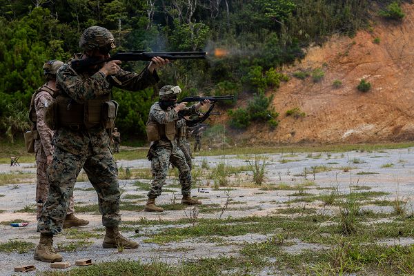 U.S. Marines with Marine Air Support Squadron (MASS) 2, 1st Marine Aircraft Wing, fire M1014 shotguns during a live-fire range at Range 22, Camp Hansen, Okinawa, Japan, Sept. 7, 2023. MASS 2 conducted this training to familiarize themselves with the M1014 shotgun and increase proficiency in rear area security operations. (U.S. Marine Corps photo by Cpl. Kyle Chan) 
