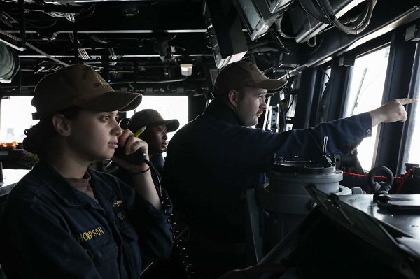U.S. 5TH FLEET (Nov. 9, 2023) Lt. j.g. Caitlyn Thomas, left, Lt. j.g. Michaela Mosley and Lt. j.g. Branson Bitzer stand watch on the bridge aboard the Arleigh Burke-class guided-missile destroyer USS Thomas Hudner (DDG 116), Nov. 9, 2023. Thomas Hudner is deployed to the U.S. 5th Fleet area of operations to help ensure maritime security and stability in the Middle East region. (U.S. Navy photo by Mass Communication Specialist 2nd Class Jordan Klineizquierdo)                                                              
