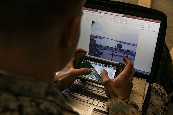 U.S. Marine Corps Cpl. Taylor Jenkins, a combat engineer with the Littoral Engineer Reconnaissance Team, 9th Engineer Support Battalion, 3d Marine Logistics Group, utilizes the Android Tactical Assault System to input reconnaissance findings into an after action report during a littoral mobility and detection exercise on Camp Pendleton, California, Nov. 18, 2021. The ATAK is a tool that allows Marines to rapidly report critical geospatial information to support intelligence requirements for a given objective. During this exercise, 7th and 9th ESB are refining their skills with emerging Marine Corps technologies in order to facilitate follow-on forces’ littoral mobility from shallow water to the objective. (U.S. Marine Corps photo by Sgt. Hailey D. Clay)