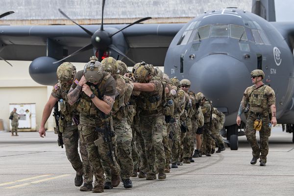 U.S. Air Force special tactics Airmen with the 320th Special Tactics Squadron pull an MC-130J Commando II 150 meters across the flightline during Monster Mash, an operational readiness and resilience training, at Kadena Air Base, Japan, May 5, 2023. These training events, consisting of physically and mentally demanding tasks, are routinely conducted among special tactics units to ensure operational readiness and enhance resiliency among the operators. (U.S. Air Force photo by Staff Sgt. Jessi Roth)