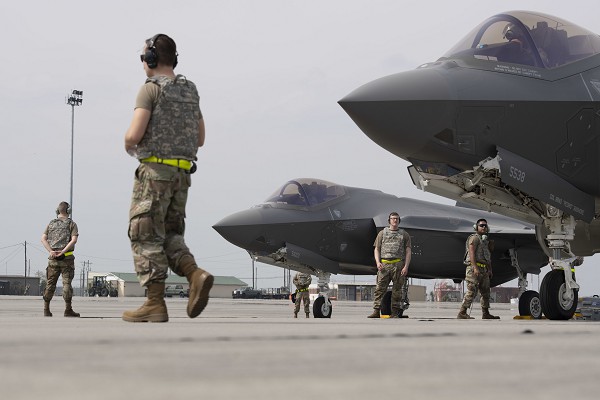 Airmen from the 388th Fighter Wing prepare for two F-35A Lightning II takeoffs during AGILE FLAG 23-1, at the Air Dominance Center, a Combat Readiness Training Center, in Savannah, Georgia, March 1, 2023. AGILE FLAG is Air Combat Command’s contributing certifying event for its Lead Wings throughout the Air Force Force Generation cycle, ensuring they are Agile Combat Employment-capable forces that meet combatant commanders’ needs. (U.S. Air Force photo by Tech. Sgt. Joshua Edwards)