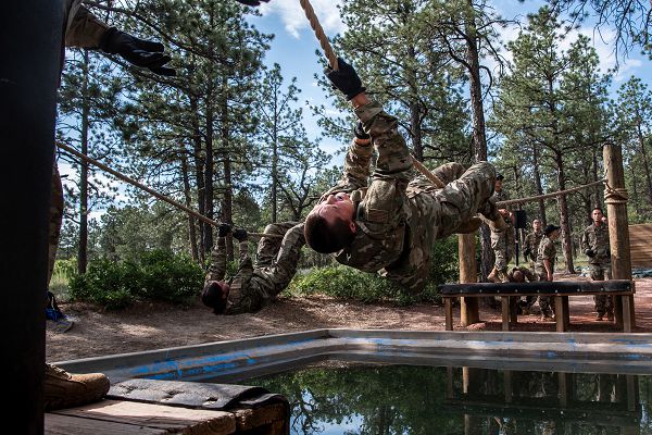 Basic cadets from the class of 2027 complete the obstacle course at the U.S. Air Force Academy's Jacks Valley in Colorado Springs, Colo., July 20, 2023. Basic Cadet Training is a six-week indoctrination program to guide the transformation of new cadets from being civilians to military academy cadets prepared to enter a four-year officer commissioning program. (U.S. Air Force photo by Rayna Grace) 