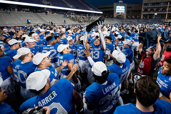U.S. Air Force Academy’s Football Squad celebrate their win against James Madison University at the Lockheed Martin Armed Forces Bowl game. The Falcons capped their 2023 season with a 9-4 record defeating JMU, 31-21, Dec. 23, 2023, at Amon G. Carter Stadium in Fort Worth, Texas. (U.S. Air Force photo by Rayna Grace) 