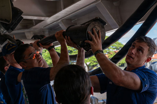 Honolulu, July 27, 2026 - U.S. Coast Guardsmen assigned to the Legend-class USCGC Kimball (WMSL 756) handle a shore tie after mooring, Honolulu, Hawaii, July 27, 2026. Thirty nations, 30 ships, five submarines, 15 national land forces, more than 190 aircraft and more than 30,000 personnel are participating in RIMPAC in and around the Hawaiian Islands, June 24 to July 31. The world’s largest international maritime exercise, RIMPAC provides a unique training opportunity while fostering and sustaining cooperative relationships among participants critical to ensuring the safety of sea lanes and security on the world’s oceans. RIMPAC 2026 is the 30th exercise in the series that began in 1971. (U.S. Coast Guard photo by [   ] Ryan [     ])