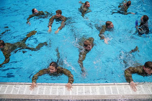 University of Arkansas Army ROTC Cadets complete the Cadet Water Survival Training (CWST) on Nov. 21, 2024, in Fayetteville, Arkansas. The CWST evaluates challenging water survival tests, preparing cadets for challenges they may face as future Army leaders. (Arkansas National Guard photo by Cadet Alexander Chrisco)