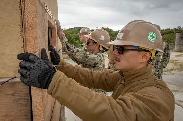 OKINAWA, Japan (Jan. 9, 2024) Sailors from Naval Mobile Construction Battalion (NMCB) 3 build a bunker during a training exercise in Okinawa, Japan. NMCB-3 serves as the stand-in engineering force for Commander, U.S. 7th Fleet, providing advanced construction and expeditionary capabilities in the Indo-Pacific region. (U.S. Navy photo by Mass Communication Specialist 1st Class Austin Ingram)                                          