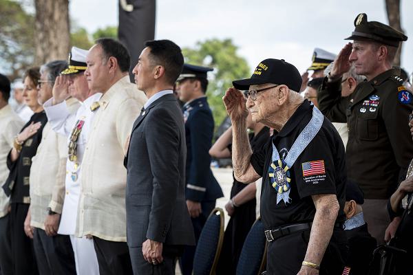 U.S. and Filipino World War II veterans salute alongside military and civilian leaders at the 80th anniversary of the Liberation of Manila at Manila American Cemetery in the Philippines, on Feb. 22, 2025. Attended by U.S. and Philippine dignitaries, the event recognized the service and sacrifice of more than 1,000 U.S. soldiers and more than 100,000 civilians who lost their lives during the fight to liberate the Philippine capital and highlighted the strength of the enduring U.S.-Philippines Alliance that has promoted peace and security in the Indo-Pacific. USINDOPACOM is committed to enhancing stability in the Indo-Pacific region by promoting security cooperation, encouraging peaceful development, responding to contingencies, deterring aggression and prevailing in conflict.  (U.S. Navy photo by Chief Mass Communication Specialist Shannon M. Smith)