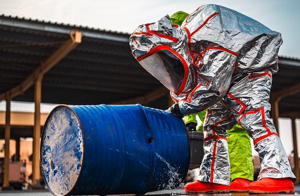 U.S. Air Force Senior Airman Jonathan Cain, 379th Expeditionary Civil Engineer Squadron fire protection firefighter, inspects a simulated hazardous materials leak within the U.S. Central Command area of responsibility, Jan. 30, 2025. Airmen mitigated the leak and decontaminated the area, practicing different scenarios to enforce proper safety procedures. (U.S. Air Force photo by Airman 1st Class Zeeshan Naeem) 