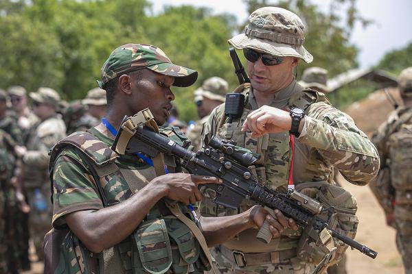 U.S. Army soldiers and members of the Tanzania People’s Defense Force (TPDF) conduct weapons clearing on day one of exercise Justified Accord 2025 (JA25) at the Msata Military Training Base in Msata, Tanzania, Feb. 11, 2025. JA25 is the premier U.S. Africa Command (USAFRICOM) exercise in East Africa, designed to enhance multinational combat readiness, strengthen crisis response capabilities and empower allies and partners in the region. Led by U.S. Army Southern European Task Force, Africa (SETAF-AF) and hosted by Kenya, Djibouti and Tanzania, JA25 integrates high-intensity training scenarios that sharpen warfighting skills, increase operational reach and enhance the ability to execute complex joint and multinational operations. (U.S. Army photo by Sgt. Michael Knight)