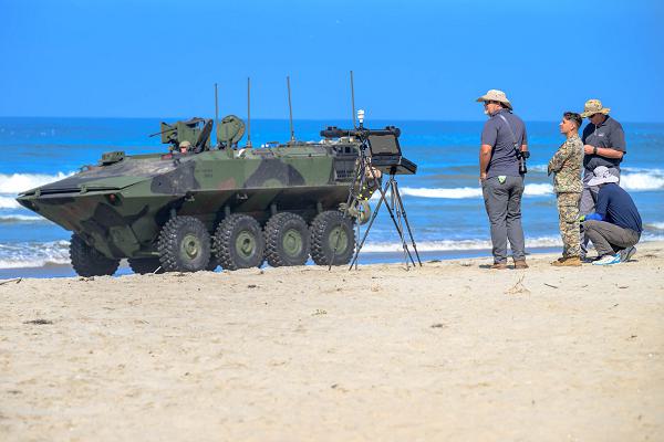 The U.S. Naval Research Laboratory (NRL) and Office of Naval Research-Global TechSolutions recently demonstrated the Marine Corps Surf Observation Tool for Littoral Expeditionary Operations during Technical Concept Experiment 24.2 (TCE 24.2) hosted by the Office of Naval Research at Camp Pendleton in Oceanside, Calif., Aug. 20-23. Meteorology and Oceanography Battlespace Surveillance Company 1st Intelligence Battalion Marines and NRL Ocean Science Division engineers observe surf conditions and LittoralLens system performance during amphibious combat vehicle operations. (U.S. Navy photo by Michael Walls)