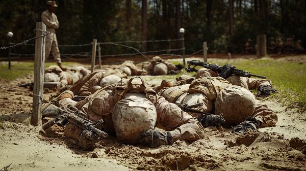 Recruits with Kilo Company, 3rd Recruit Training Battalion, execute the Battle of Fallujah event during the Crucible at Marine Corps Recruit Depot Parris Island S.C., March 20, 2025. The Crucible is the culmination of the knowledge and skills recruits learn throughout recruit training. (U.S. Marine photo taken by Lance Cpl. Jacob Claudell)