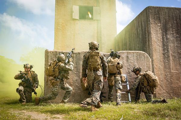 U.S. Marine Corps students with School of Infantry-West, Advanced Infantry Training Battalion, Detachment Hawaii conduct close quarters combat operations during the Advanced Infantry Marine Course at Bellows Air Force Station, Hawaii, March 12, 2025. Multi-day training was conducted as part of the AIMC, a course designed to test and progress military occupational specialty skills within the infantry and certify Marines to be squad leaders. (U.S. Marine Corps photo by Cpl. Matthew Benfield)
