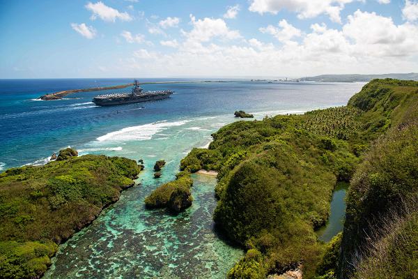 250418-N-ML137-1075 APRA HARBOR, Guam (April 18, 2025) Nimitz-class aircraft carrier USS Nimitz (CVN 68) arrived in Guam for a scheduled port visit, April 18. For five decades, the Nimitz Carrier Strike Group has upheld the U.S. Navy’s commitment to forward presence while ensuring maritime security, deterring aggression, and power projection. As the Navy celebrates 250 years of service this year, we are reminded of how the Navy has promoted prosperity and security, and protected the American way of life. (U.S. Navy Photos by Mass Communication Specialist 1st Class Samantha Jetzer)