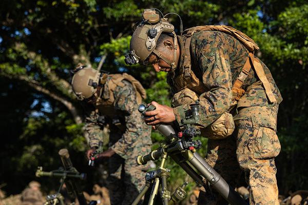U.S. Marine Corps Cpl. Juan Garcia employs an M224 60mm mortar during a field training exercise at the Central Training Area, Camp Hansen, Okinawa, Japan, May 14, 2025. The FTX allowed Marines to build tactical proficiency in support of expeditionary advanced base operations. Garcia, a native of the Dominican Republic, is a mortarman with 12th Littoral Combat Team, 12th Marine Littoral Regiment, 3d Marine Division. (U.S. Marine Corps photo by Lance Cpl. Rodney Frye)