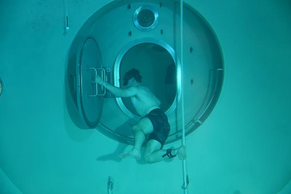 U.S. Naval Submarine Schools students conduct training in the school’s Pressurized Submarine Escape Trainer as part of their curriculum, May 13, 2025. The PSET teaches submarine sailors how to escape from a submarine that is unable to surface and then survive on the water’s surface until help arrives. U.S. Navy photos by SN Duncan Woodard