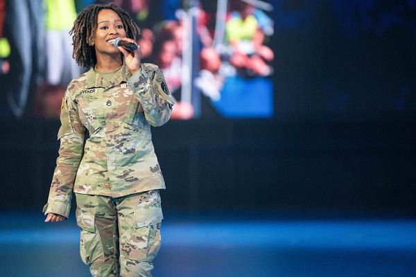 U.S. Army Staff Sgt. Imani Grosvenor, assigned to The U.S. Army Chorus, performs during Twilight Tattoo at Joint Base Myer-Henderson Hall, Va., May 28, 2025. (U.S. Army photo by Cpl. Joseph Martin)
