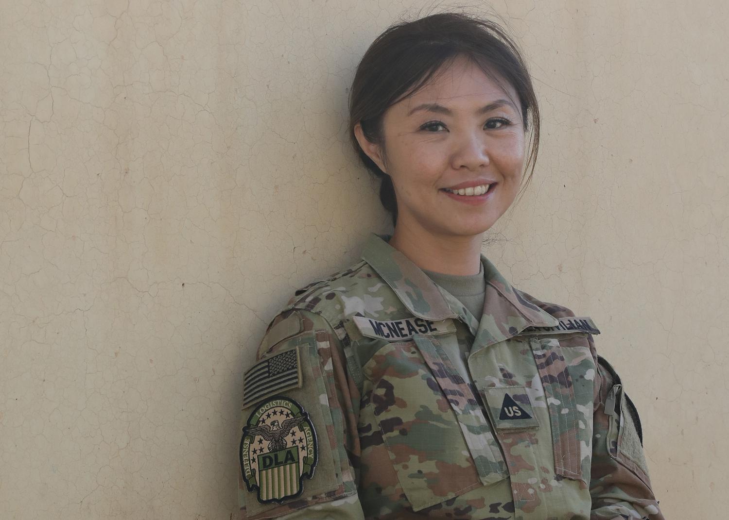 Defense Logistics Agency Civilian Gee Hyun McNease, deployed as the deputy commander of the DLA Support Team-Kuwait at Camp Arifjan, Kuwait, is a native of the Republic of Korea. McNease said her first consciousness of America was from her parents, who were grateful to American Soldiers who liberated her country from the Communists. (U.S. Army photo by Staff Sgt. Neil W. McCabe)
