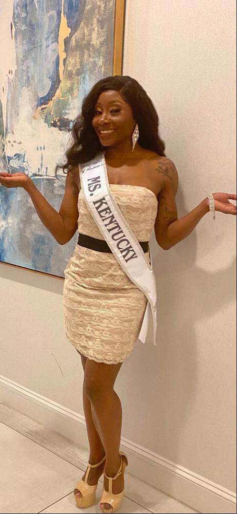 Master Sgt. Diana Layne, unit supply specialist, 1st Theater Sustainment Command, wears her sash before being crowned United States of America Ms. Kentucky 2022 at a pageant in Tifton, Georgia, Oct. 24, 2021. Layne has been deployed twice to Iraq and twice to Afghanistan during her 21 years serving in the U.S. Army.