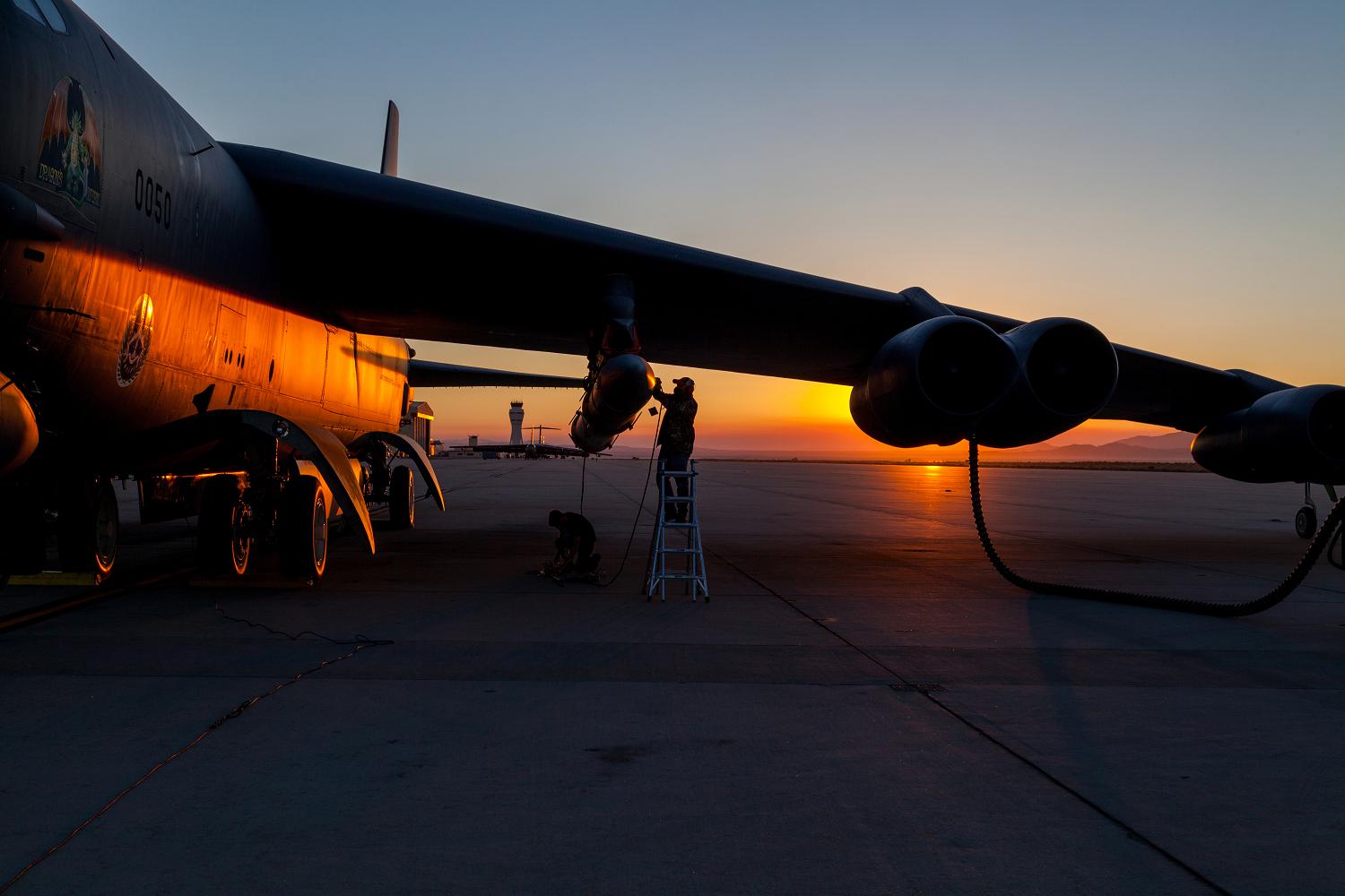 Members of the AGM-183A Air-launched Rapid Response Weapon Instrumented Measurement Vehicle 2 test team make final preparations prior to a captive-carry test flight of the prototype hypersonic weapon at Edwards Air Force Base, California, Aug. 8. (photo by Kyle Brasier)
