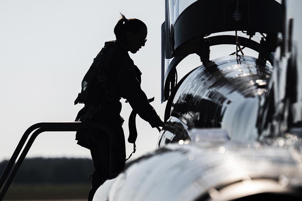 T-38 Talon Boarding at Alpena- Air Force Capt. Hannah Myers steps into a T-38 Talon at Alpena Combat Training Center, Alpena, Mich., July 16, 2021.  (Photo by Staff Sgt. Devin Rumbaugh)