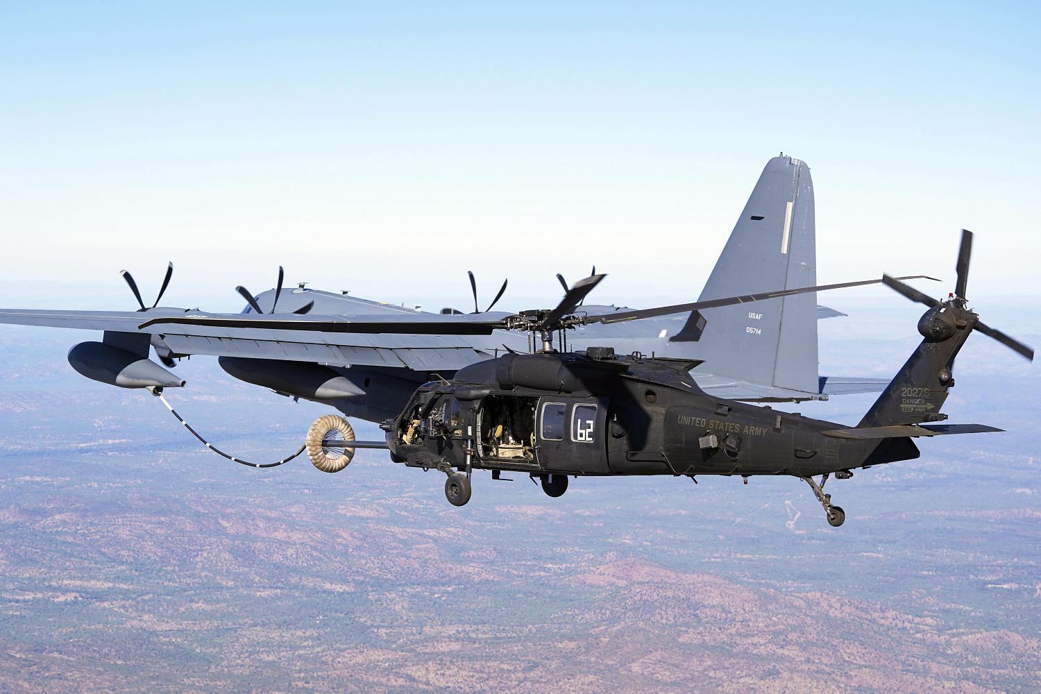 An MC-130J Air Commando II conducts helicopter air-to-air refueling with an MH-60 Black Hawk, both supporting Special Operations Command Pacific, during Talisman Sabre 21 above Queensland, Australia, July 26, 2021. TS21 is Australia’s largest military exercise with the U.S. and is a demonstration of the strong alliance underpinned by deep levels of cooperation and trust built over decades of operating and training together. (U.S. Air Force photo by 1st Lt. Joshua Thompson)