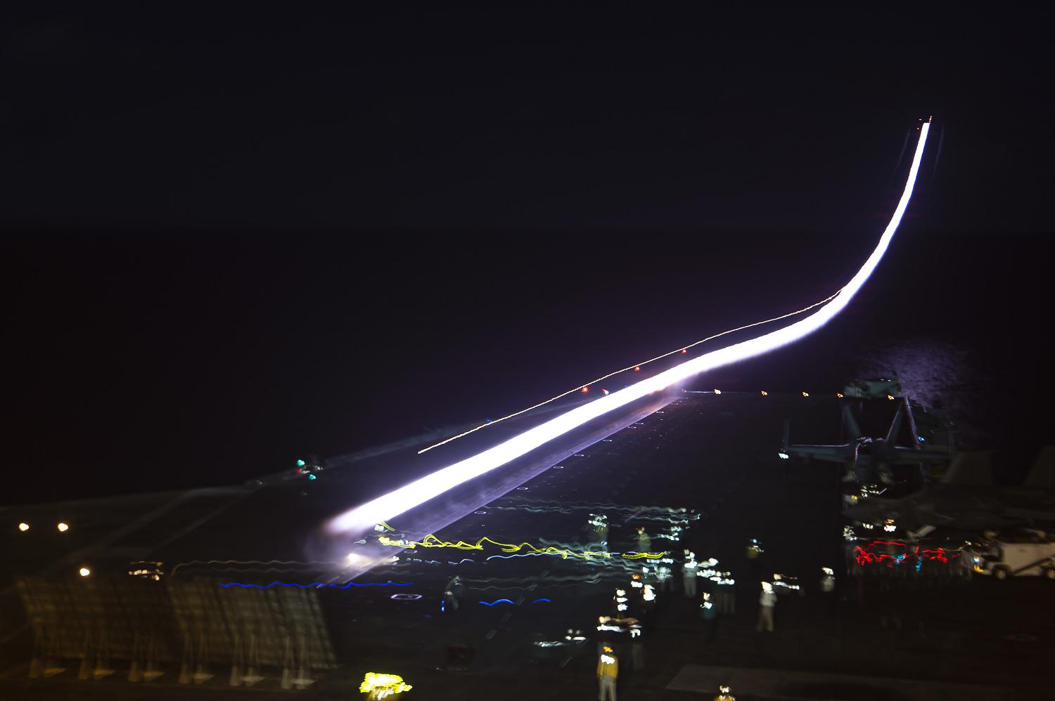 210821-N-OL611-1032 PACIFIC OCEAN (August 21, 2021) An F/A-18F Super Hornet, assigned to the “Bounty Hunters” of Strike Fighter Squadron (VFA) 2, takes off from the flight deck of Nimitz-class aircraft carrier USS Carl Vinson (CVN 70), August 21, 2021. Carl Vinson Carrier Strike Group is on a rotational deployment in the U.S. 7th Fleet area of operation to enhance interoperability with allies and partners and serve as a ready-response force in support of a free and open Indo-Pacific region. (photo by Mass Communication Specialist 3rd Class Tyler Wheaton)