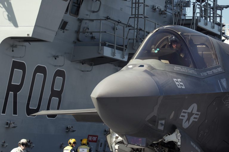 Royal Navy Cmdr. Nathan Gray in his F35B following the first deck landing aboard HMS Queen Elizabeth. Gray and Royal Air Force Sq. Ldr. Andy Edgell, both test pilots at the F-35 Integrated Test Force at Naval Air Station Patuxent River, Maryland, landed the first two jets on the new British aircraft carrier this week. Photo: Petty Officer Aaron Hoare, Royal Navy