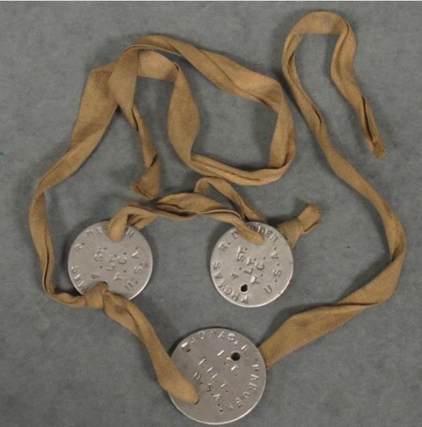 These original World War I dog tags belonged to Navy and Army veteran Thomas R. Darden. The tags are tied with twill rope or tape. Darden served in the Navy from 1903-1908 and in the Army as an officer from 1917 through the end of the Great War.