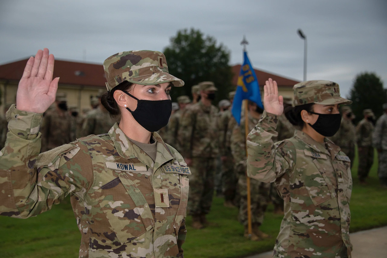 Space Force 2nd Lts. Amy Coba and Elizabeth Kowal, graduates of Air University’s Officer Training School Class 20-08, recite the Space Force oath of office at Maxwell Air Force Base, Ala., Oct. 16, 2020.