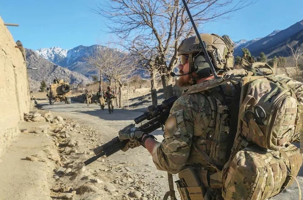 Secure communications are a top priority for the unique nature of Special Forces missions, such as the one pictured featuring a U.S. Army Special Forces Soldier, attached to Special Operations Task Force-Afghanistan, providing security prior to an assault in the Alingar district, Laghman province, Afghanistan, Feb. 18, 2018. Recently fielded, the Tactical Key Loader, developed specifically for Special Operations Forces due to its smaller, dimmer screen and one-button key fill capability, provides cryptographic keys that block unauthorized individuals from accessing mission information. (photo by Sgt. Connor Mendez)
