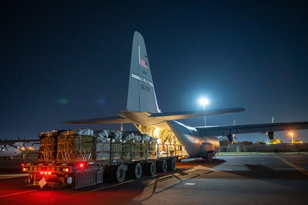 Over 38,000 meals, ready to eat and water destined for an airdrop over Gaza are loaded aboard a U.S. Air Force C-130J Super Hercules at an undisclosed location in Southwest Asia, March 1, 2024. The U.S. Air Force’s rapid global mobility capability enables the expedited movement of critical, life-saving supplies throughout the Middle East. (U.S. Air Force courtesy photo) 