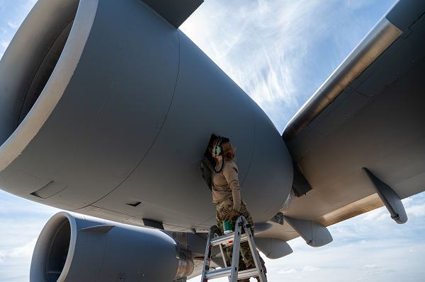 Airman 1st Class Lyric Kennedy, 62nd Aircraft Maintenance Squadron aerospace propulsion journeyman, performs maintenance on one of the four engines of the C-17 Globemaster III during the 62nd Airlift Wing’s all-female, five-day mission on the flightline at Travis Air Force Base, Calif., March 25, 2024. The C-17 has a maximum load capacity of 170,900, making it useful in the transportation of large assets. (U.S. Air Force photo by Airman Colleen Anthony) 