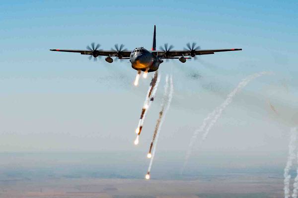 A C-130H Hercules from the 302nd Airlift Wing expends chaff and flares during a training sortie as a part of exercise Ivy Mass 2024, June 13, 2024, in eastern Colorado. Chaff and flares are defensive countermeasures used to confuse enemy radar and heat-seeking missiles. (U.S. Air Force photo by Tech. Sgt. Justin Norton) 