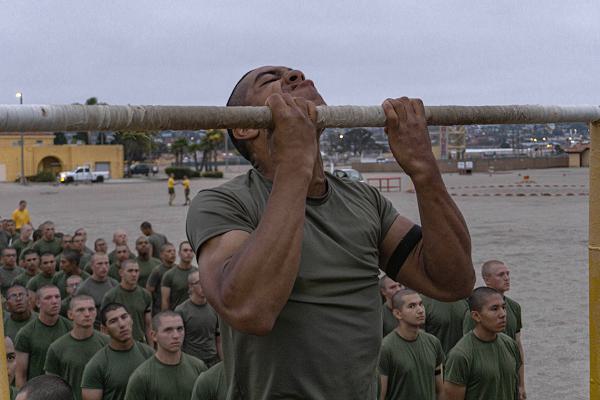 A U.S. Marine Corps recruit with Golf Company, 2nd Recruit Training Battalion, executes pull-ups as part of the physical fitness test at Marine Corps Recruit Depot San Diego, California, July 8, 2024. The PFT is an evaluation that all recruits must pass and sets the standards all Marines must maintain once a year to assess battle readiness as well as physical condition. (U.S. Marine Corps photo by Lance Cpl. Alexandra M. Earl)