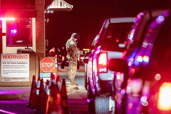 Senior Airman Jackson Morrow, 802nd Security Forces Squadron installation patrolman, verifies a visitor’s base-access pass at Joint Base San Antonio-Lackland, Texas, June 26, 2024. JB San Antonio-Lackland receives and scans base-access authorizations for approximately 36,000 vehicles and pedestrians each day and turns away approximately 51,000 unauthorized visitors annually. (U.S. Air Force photo by Brian Boisvert) 