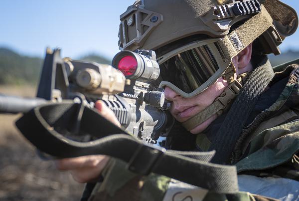 Staff Sgt. Miles Winford, 821st Contingency Response Squadron weather technician, takes aim down his M-4 carbine scope during exercise Strom Crow, at Fort Hunter-Liggett, Calif., June 26, 2024. The 621st Contingency Response Wing inspection team validated and certified the 821st CRS during the exercise on multiple areas of interest, such as base defense and chemical, biological, radiological and nuclear readiness for their upcoming deployment alert cycle this fall. (U.S. Air Force photo by Staff Sgt. Scott Warner) 