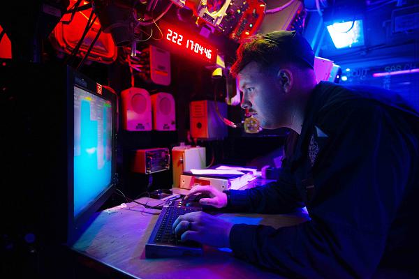 240809-N-RG232-2269 ATLANTIC OCEAN (Aug. 9, 2024) Operations Specialist 2nd Class Brandon Davis, a native of Ocala, Florida, tracks the course of the Nimitz-class aircraft carrier USS Harry S. Truman (CVN 75), in the Voyage Management System console, Aug. 9. The Harry S. Truman Carrier Strike Group is underway in the Atlantic Ocean completing integrated naval warfighting training. Composite Unit Training Exercises are an intense, multi-week exercise designed to fully integrate a carrier strike group as a cohesive, multi-mission fighting force, to assess their ability to carry out sustained combat operations from the sea, and drive future warfighting development. (U.S. Navy Photo by Mass Communication Specialist 3rd Class Darren Cordoviz)