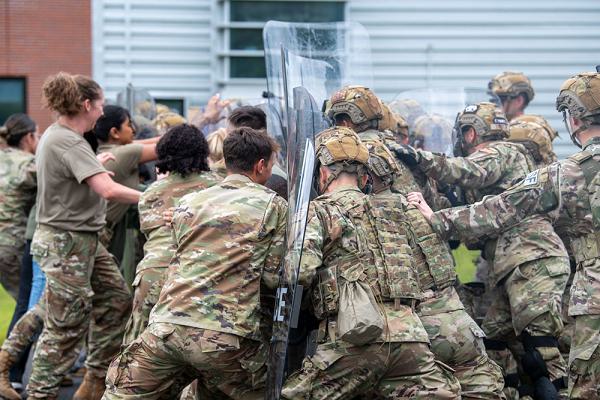 Members of the 104th Fighter Wing Security Forces Squadron conduct riot control training, Aug. 20, 2024, at Barnes Air National Guard Base in Westfield, Mass. During the exercise, 104th FW members and civilians volunteered to act as the crowd, enabling the riot control team to receive valuable training in crowd control and tactical strategies. (U.S Air National Guard photos by Jay Hewitt) 