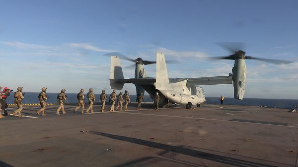 French Special Forces board a U.S. Marine Corps MV-22 Osprey tiltrotor aircraft with Marine Medium Tiltrotor Squadron 365 (Reinforced), 24th Marine Expeditionary Unit Special Operations Capable, aboard the French Mistral-class amphibious assault ship FS Mistral (L9013) during Baltic Operations (BALTOPS) 24, June 12, 2024. BALTOPS 24 is the premier maritime-focused exercise in the Baltic region. The exercise, led by U.S. Naval forces Europe-Africa and executed by Naval Striking and Support Forces NATO, provides a unique training opportunity to strengthen combined response capabilities critical to preserving freedom of navigation and security in the Baltic Sea. (U.S. Marine Corps photo by Cpl. Elton Taylor)