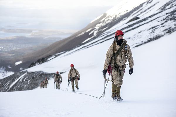 U.S. Marine Corps Mountain Warfare Training Center instructors hike as 3-man glacier teams alongside Argentine marines to the summit of a mountain range at Martial Glacier in Ushuaia, Argentina, Sept. 6, 2024. Knowledge exchanges such as these foster camaraderie and mutual reliance between U.S. and Argentine forces which aims to strengthen their ability to work together for future exercises. (U.S. Marine Corps photo by Cpl. Samuel Qin)
