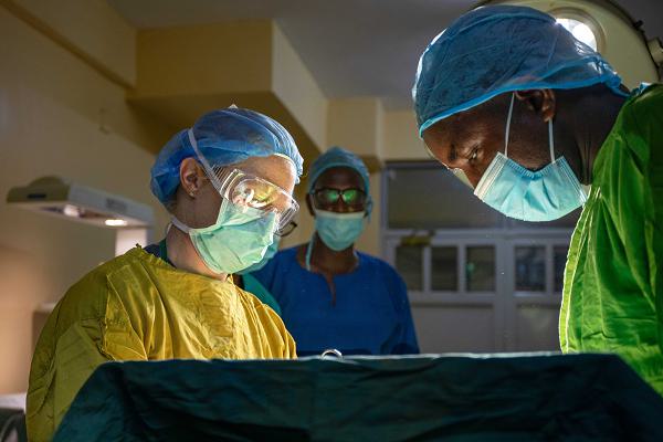 U.S. Army Lt. Col. Sarah Rabie, an obstetrician (60J) assigned to the 30th Medical Brigade, left, and a Burundian obstetrician, right, perform a cesarean section (C-section) at the Hospital Military De Kamenge during the medical readiness exercise (MEDREX) in Bujumbura, Burundi, July 23, 2024.A MEDREX is a medical readiness exercise, planned and executed by U.S. Army Southern European Task Force, Africa (SETAF-AF), enabling military health professionals from the U.S. and their African partners to exchange medical practices, procedures and techniques that enhance treatment capabilities and result in lasting relationships between the participants.(U.S. Army photo by 1st Lt. Katherine Sibilla)